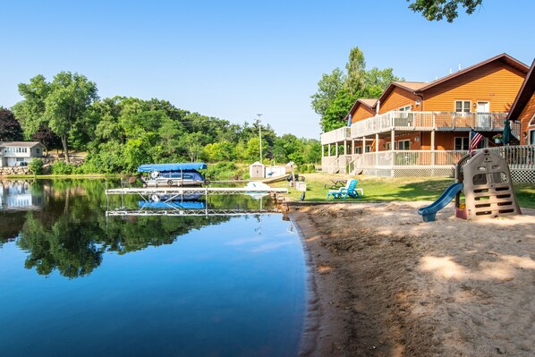 Property grounds - Inviting lakefront stand-alone condo with private beach, boating, & playground (Wisconsin Dells)