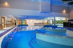 2 indoor pools, seasonal outdoor pool, pool umbrellas, sun loungers