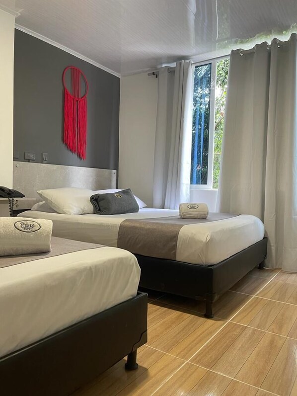 トラディショナル トリプルルーム | WiFi (無料)、ベッドシーツ