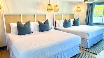 Deluxe Two-King One-Bedroom Suite | 1 bedroom, iron/ironing board, free WiFi, bed sheets