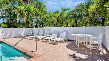 Outdoor pool, pool umbrellas, sun loungers