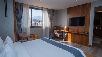 Pillow-top beds, minibar, in-room safe, desk