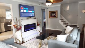 Smart TV, fireplace, table tennis, books