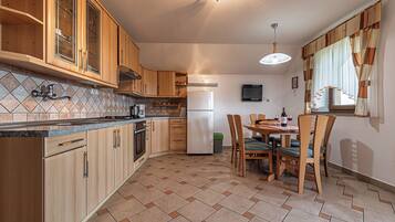 Family House, 1 Bedroom, Mountainside (Vineyard Cottage Ucman) | Private kitchen | Fridge, oven, stovetop, cookware/dishes/utensils
