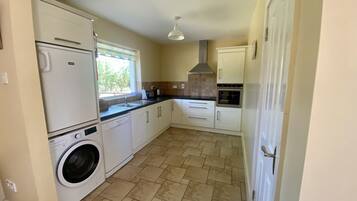 Cottage, Multiple Beds | Laundry