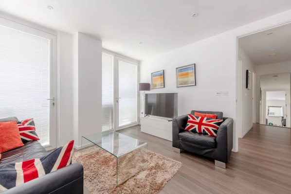 Basic Apartment, 2 Double Beds | Living area | TV