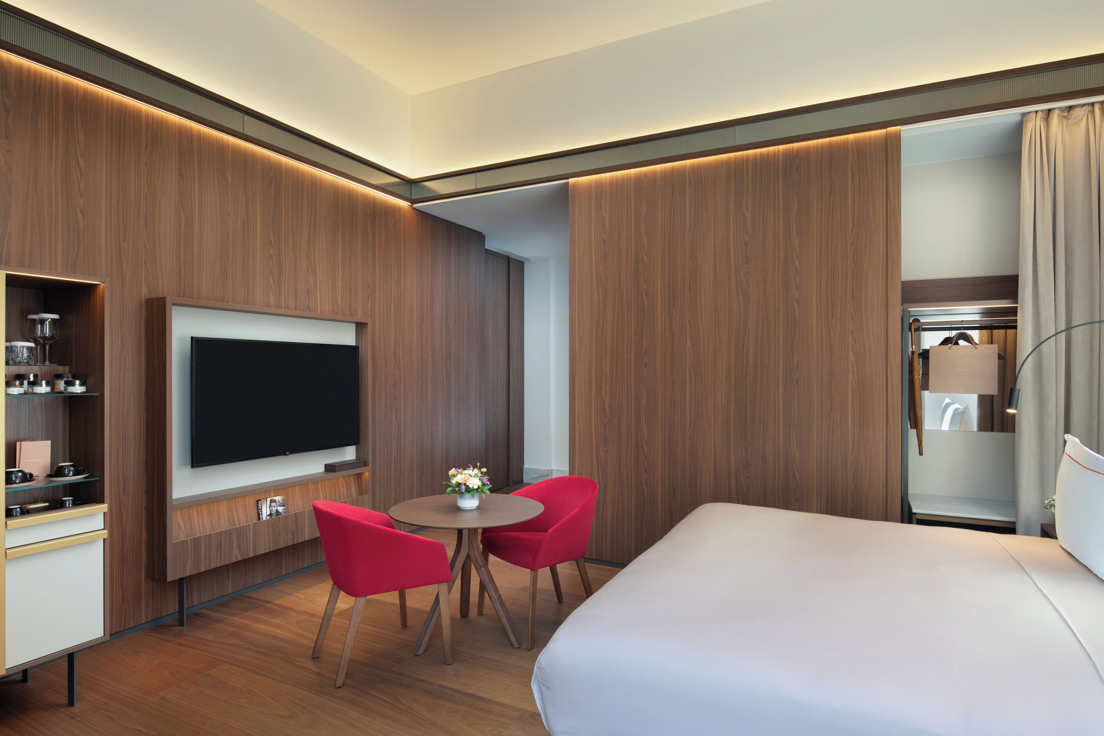 Hypo-allergenic bedding, down comforters, minibar, in-room safe