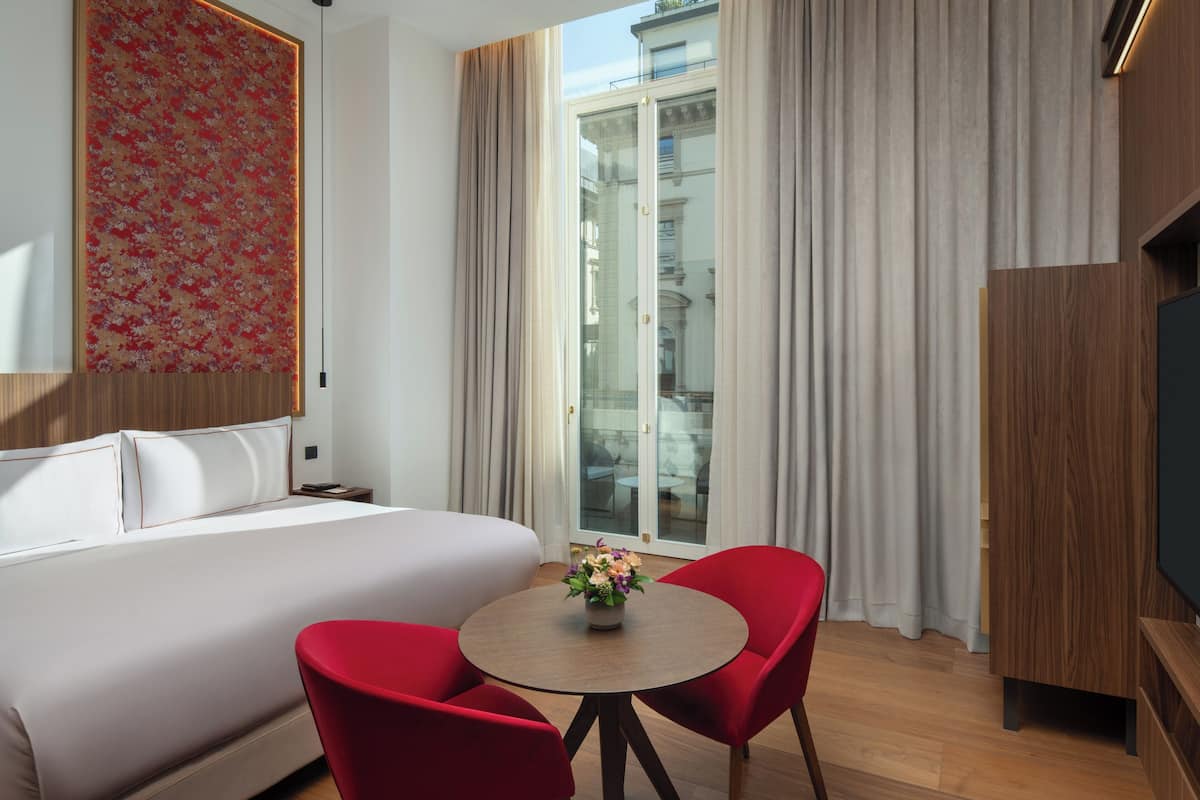 Supreme Room with Balcony with Spa Access | Hypo-allergenic bedding, down comforters, minibar, in-room safe