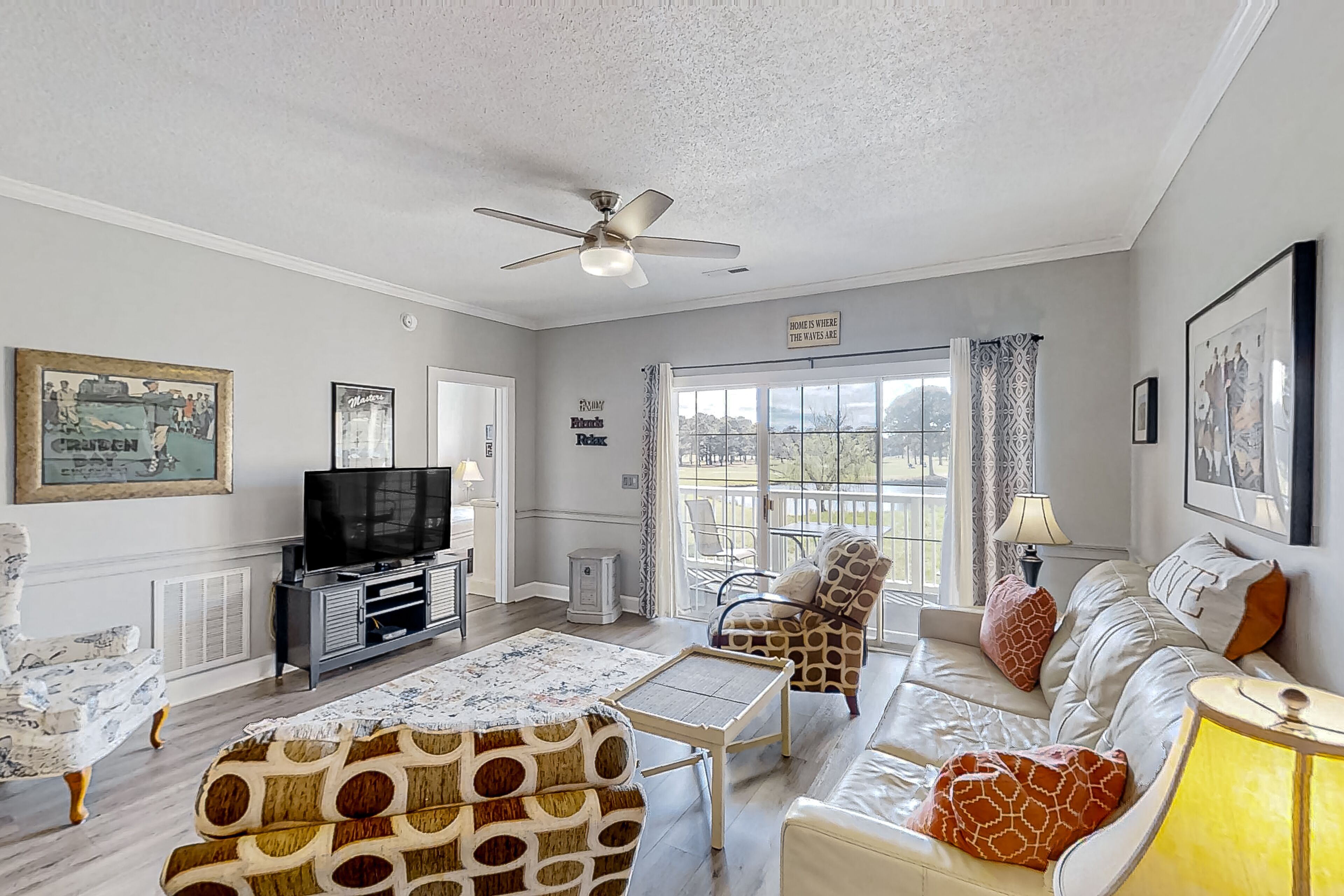 Peaceful water view condo with balcony, pool, kitchen, washer/dryer, & elevator