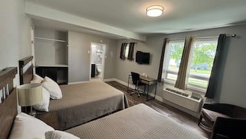 1 habitación, escritorio y espacio para trabajar con laptop