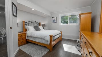 1 bedroom, desk, iron/ironing board, travel crib