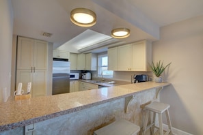 Condo, 2 Bedrooms | Private kitchen | Fridge, oven, stovetop, coffee/tea maker