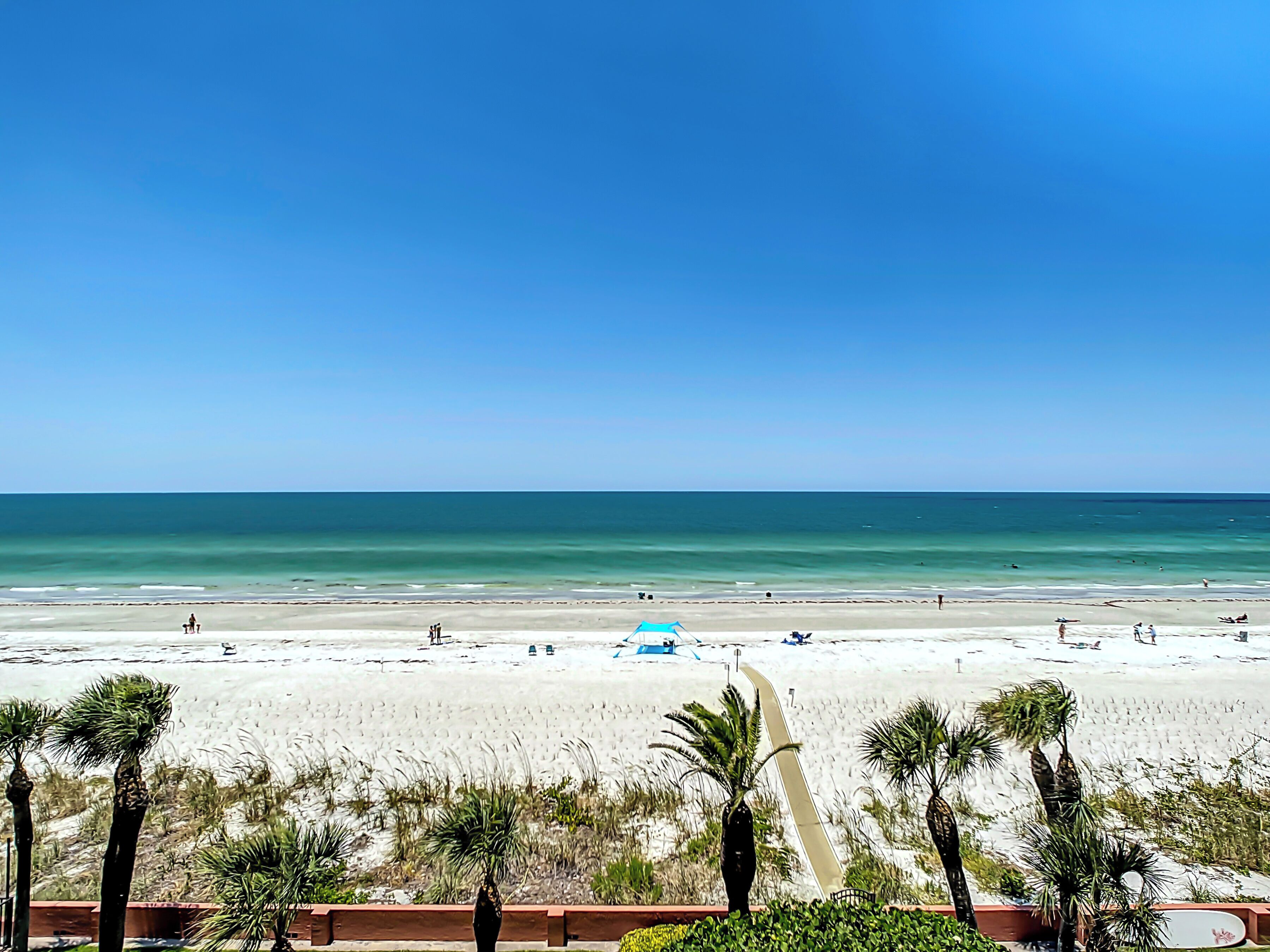 On the beach, sun-loungers, beach towels