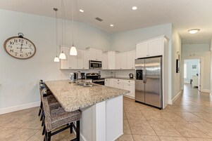 Fridge, oven, coffee/tea maker, toaster