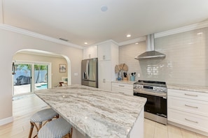 House, 2 Bedrooms | Private kitchen | Fridge, oven, coffee/tea maker, toaster - Sandcastle by the Sea managed by Beach Retreats (Holmes Beach)