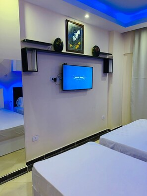 1 غرفة نوم ومكواة/لوح كي وواي فاي وملاءات أسرّة