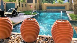 Outdoor pool - Spacious 2bedroom With Burj View in Downtown Dubai (Dubai)