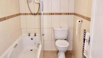 Apartment, 1 King Bed | Bathroom | Combined shower/bathtub, deep-soaking bathtub, hair dryer, towels