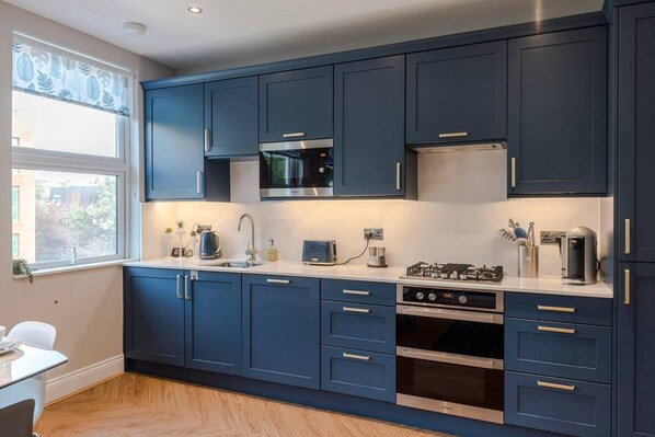 Apartment | Private kitchen | Fridge, microwave, oven, stovetop