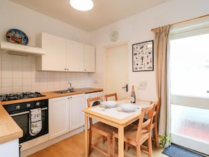 Fridge, electric kettle, toaster, cookware/dishes/utensils