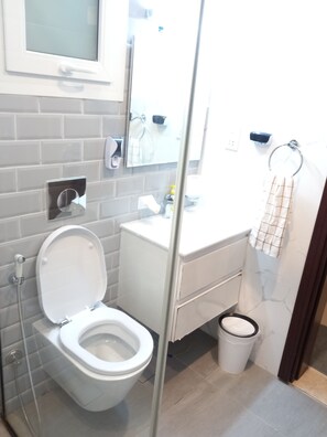 Leilighet | Bad | Dusj og håndklær