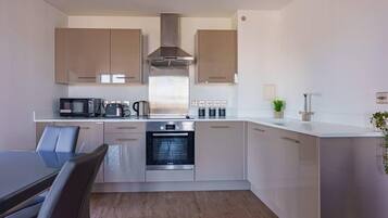 Apartment | Private kitchen | Fridge, microwave, oven, stovetop