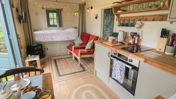 Fridge, electric kettle, toaster, cookware/dishes/utensils