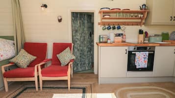 Fridge, electric kettle, toaster, cookware/dishes/utensils