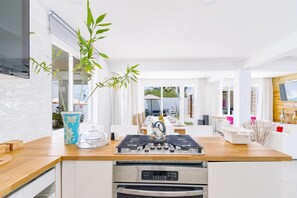 House (3 Bedrooms) | Private kitchen | Microwave, stovetop