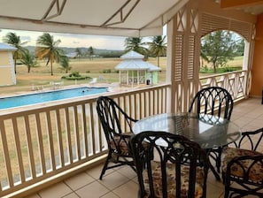 Outdoor dining - Spacious two bedroom condo with pool access (Lowlands)