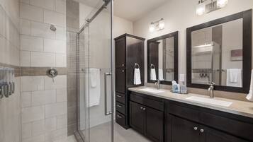 Shower, eco-friendly toiletries, hair dryer, towels