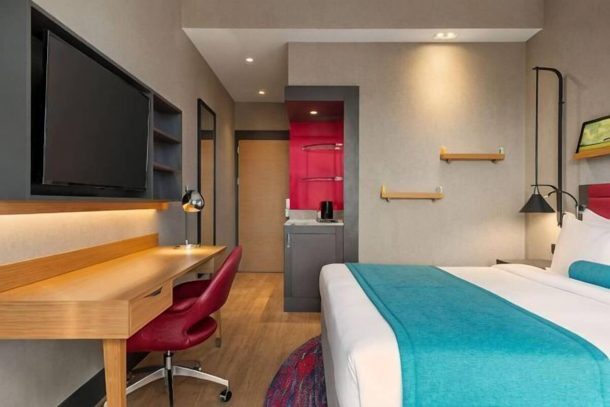 Premium bedding, down duvets, Select Comfort beds, minibar
