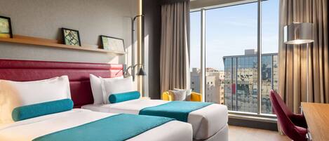 Premium bedding, down comforters, Select Comfort beds, minibar