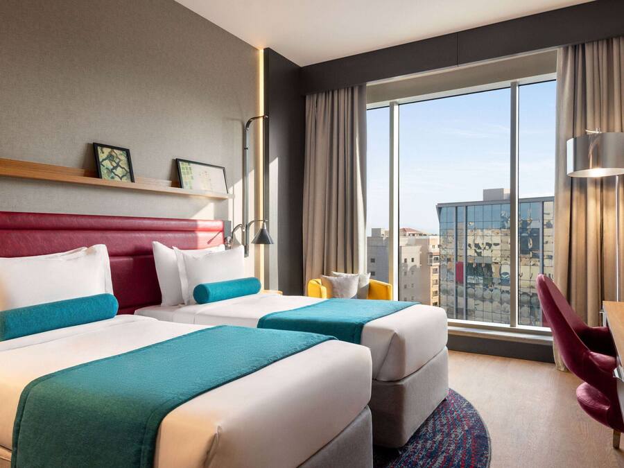 Premium bedding, down comforters, Select Comfort beds, minibar