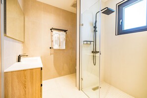 Shower, hair dryer, towels, soap