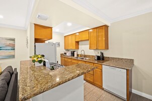 Comfort Apartment | Private kitchen | Full-size fridge, microwave, oven, stovetop