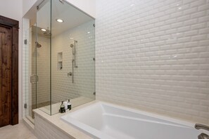 Bathtub, hair dryer, towels