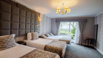 Desk, laptop workspace, blackout drapes, iron/ironing board