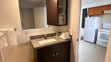 Hair dryer, towels, soap, shampoo