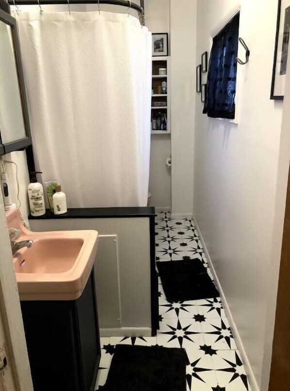 Hair dryer, towels, soap, shampoo