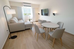 Room, 1 King Bed, Non Smoking (Living Room) | Premium bedding, pillowtop beds, in-room safe, desk - Wyndham Garden El Morro Montecristi (Monte Cristi)