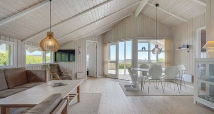 Holiday home with sauna, hot tub and sea view