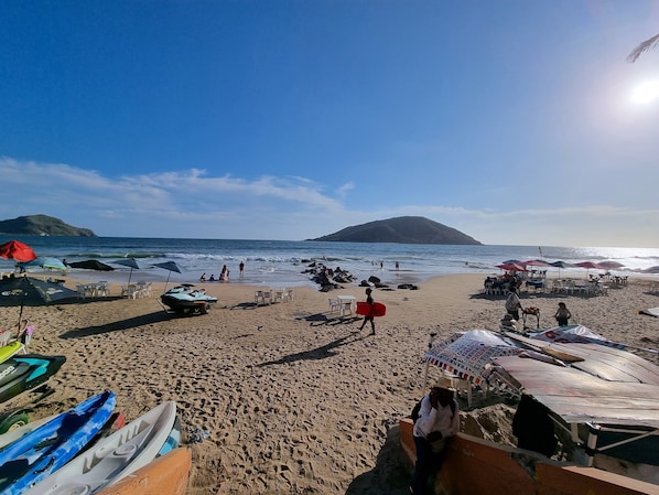 On the beach, beach umbrellas