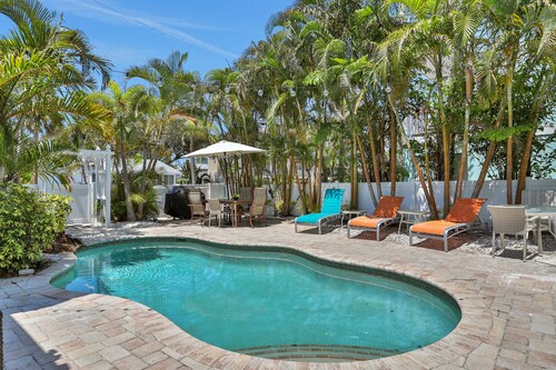 Walk-up suite with on-site pool, private deck, full kitchen - walk to beach