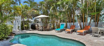 Walk-up suite with on-site pool, private deck, full kitchen - walk to beach