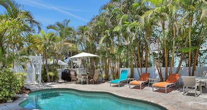 Walk-up suite with on-site pool, private deck, full kitchen - walk to beach