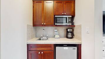 Microwave, coffee/tea maker, toaster, cookware/dishes/utensils