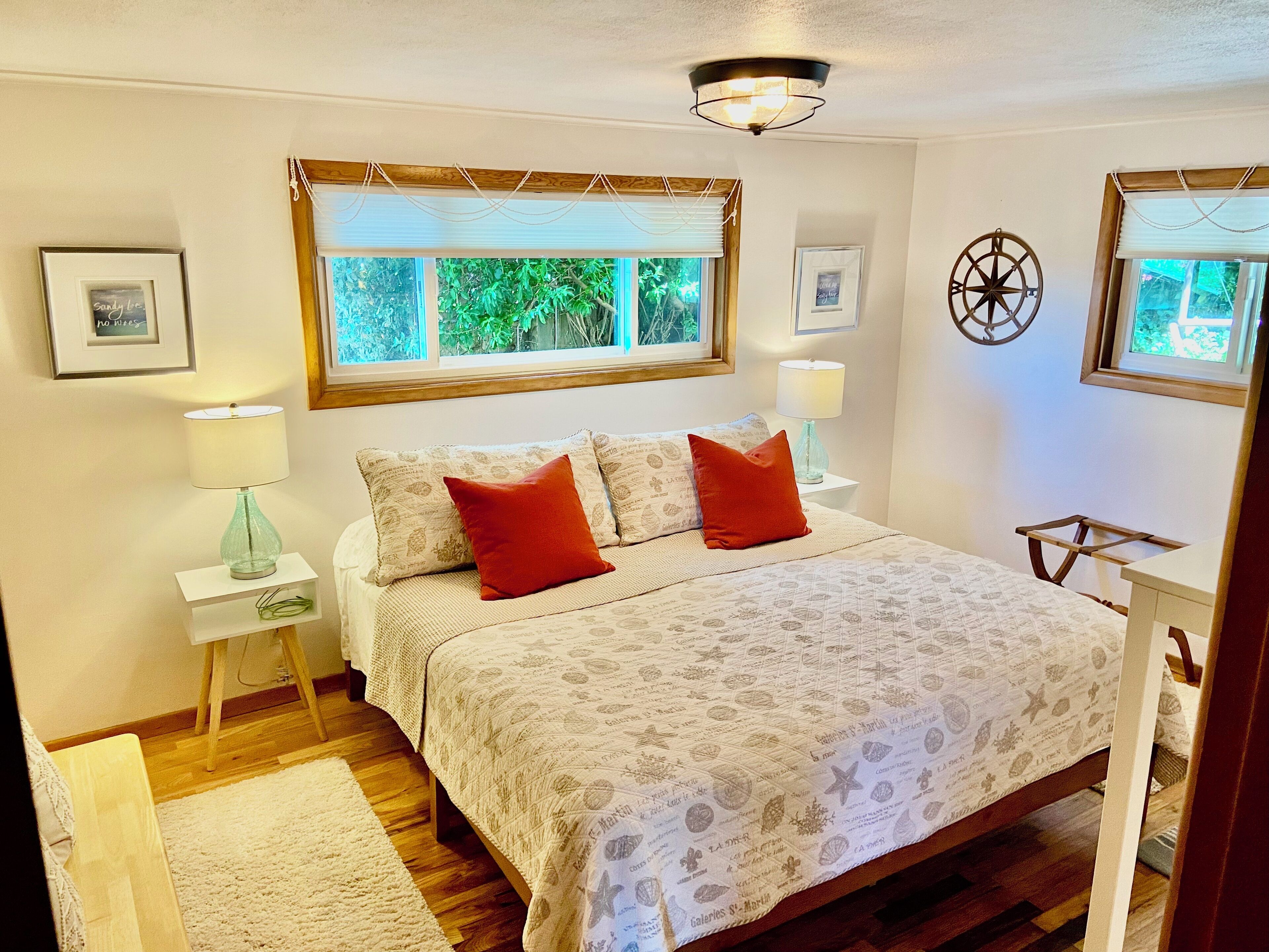#1 Bedroom, King Bed, door to backyard with Sitting Area / trail to Upper Deck.