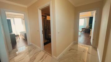 Family Room, Non Smoking, Sea View | Frette Italian sheets, premium bedding, down comforters, minibar