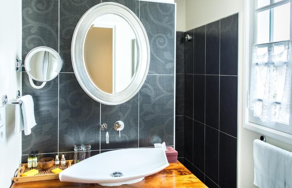 deluxe double room | bathroom | shower, rainfall showerhead, free toiletries, dressing gowns